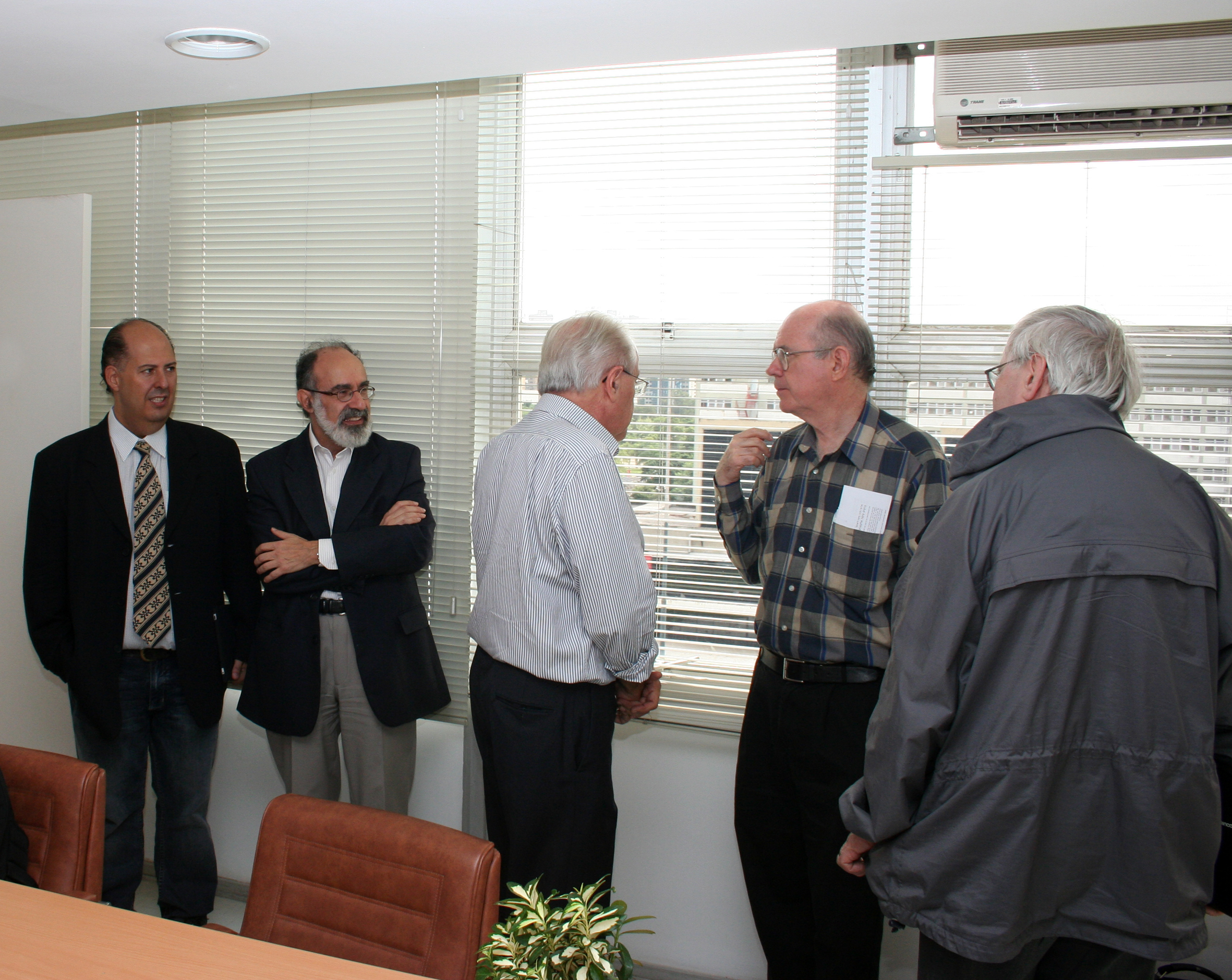 Guilherme Ary Plonski, César Ades, Eliezer Rabinovici and Peter Goddard