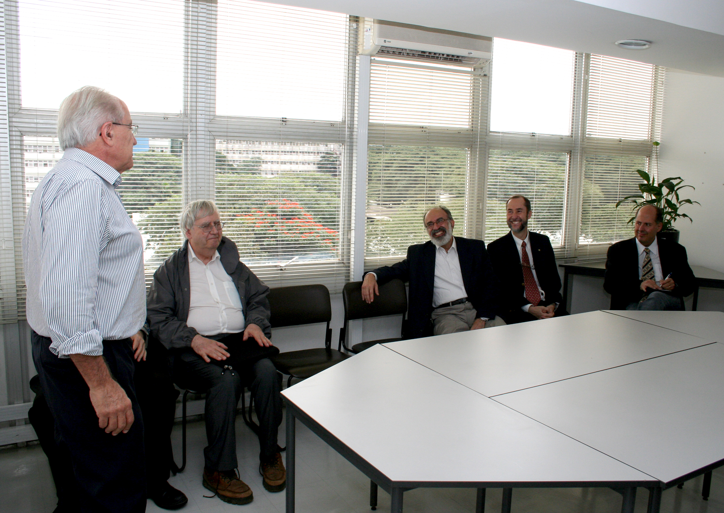 César Ades, Peter Goddard, Guilherme Ary Plonski and Antonio Mauro Saraiva
