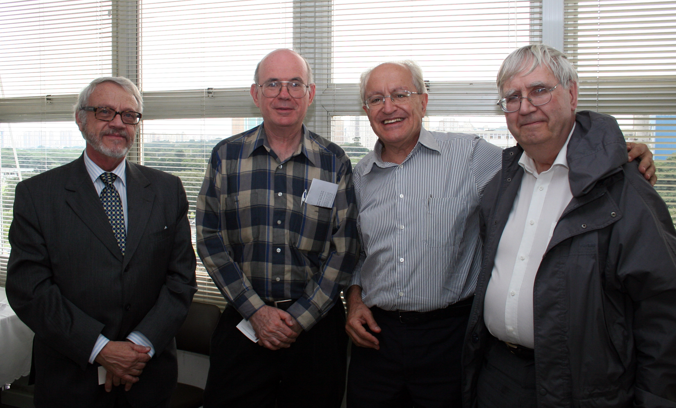 Adnei Melges de Andrade, Eliezer Rabinovici (director of the Institute of Advanced Studies in Jerusalem), César Ades and Peter Goddard (director of the Institute of Advanced Studies in Princeton)