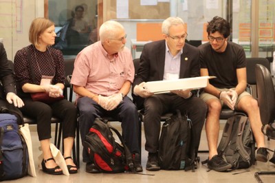 Participants interacting with documents of the Institute's archive