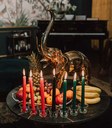 Frutas e velas para a celebração do Kwanzaa Frutas e velas para a celebração do Kwanzaa