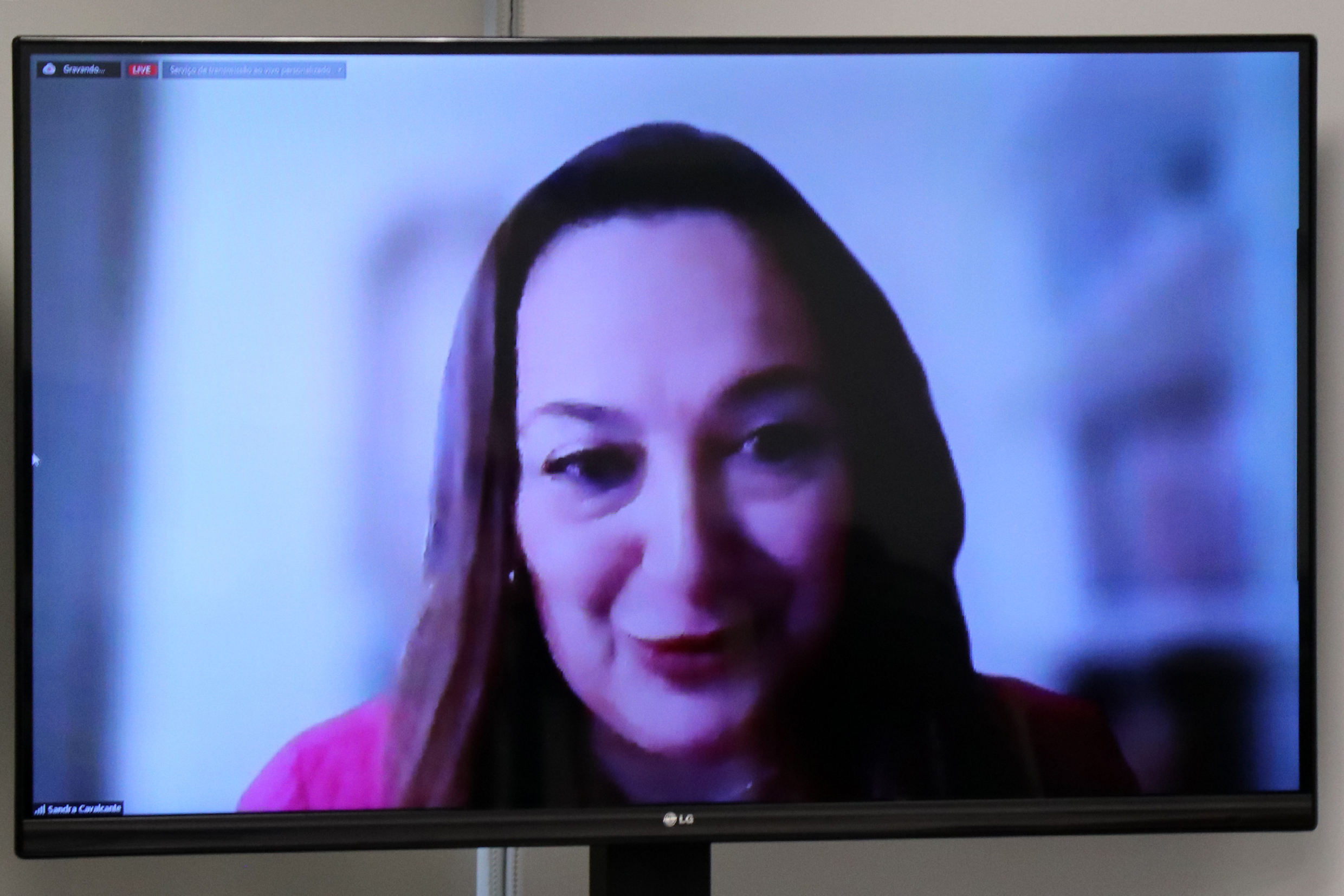Sandra Cavalcante, via vídeo-conferência