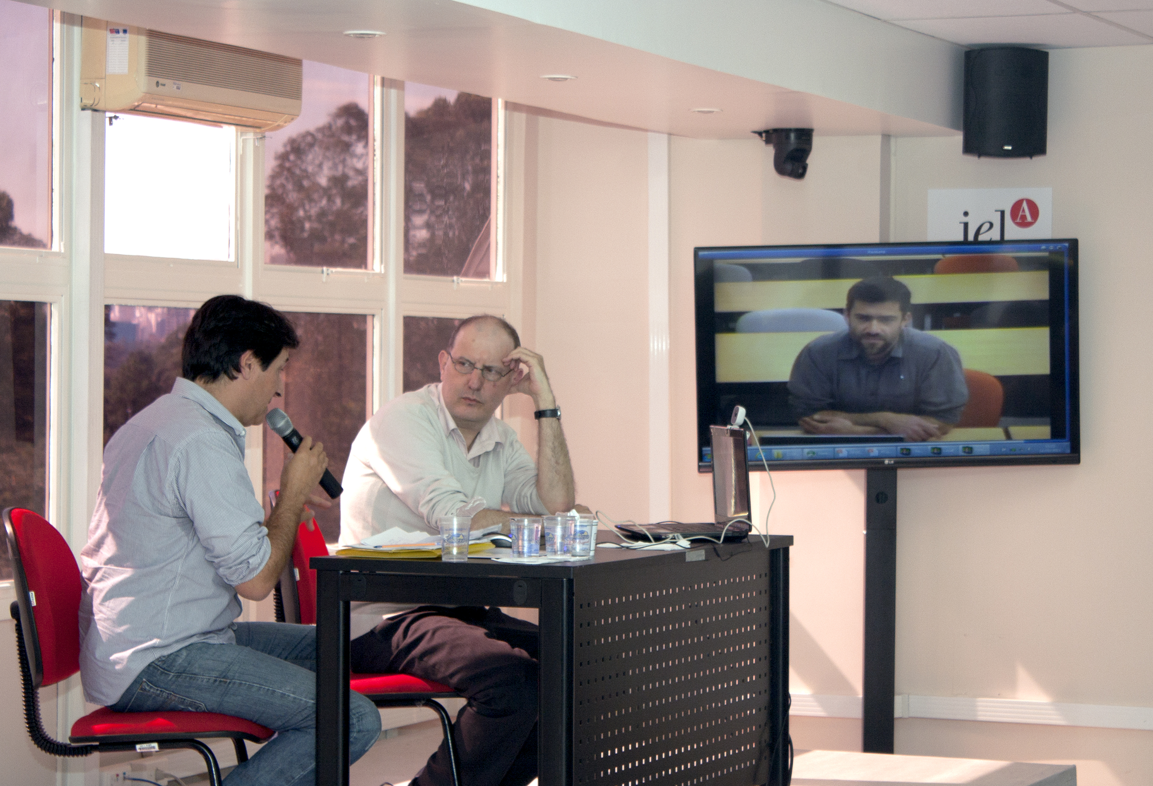 Rodolfo Puttini, Maurício de Carvalho Ramos e Nicolas Lechopier via teleconferência
