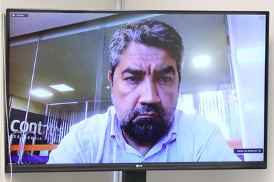 André Luís dos Santos , via vídeo-conferência